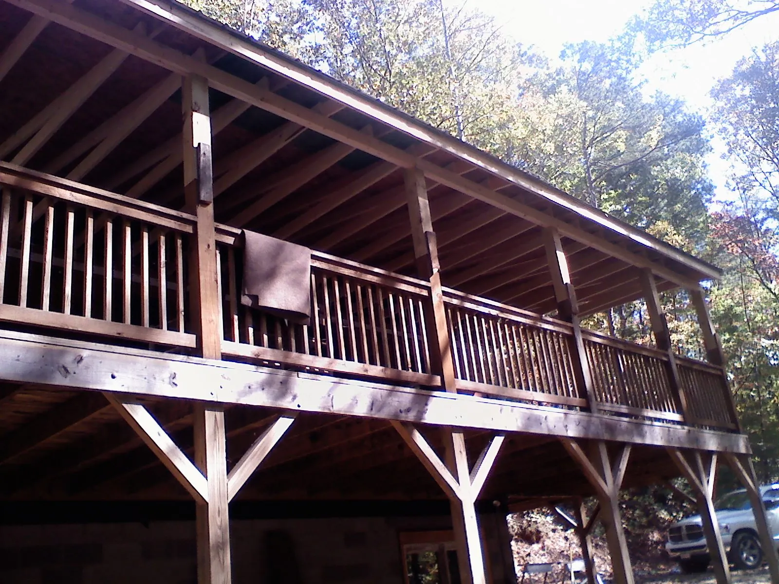 Timber framing under a new elevated porch and deck — Roof Leak Repair in Logansport by Roofing Brothers